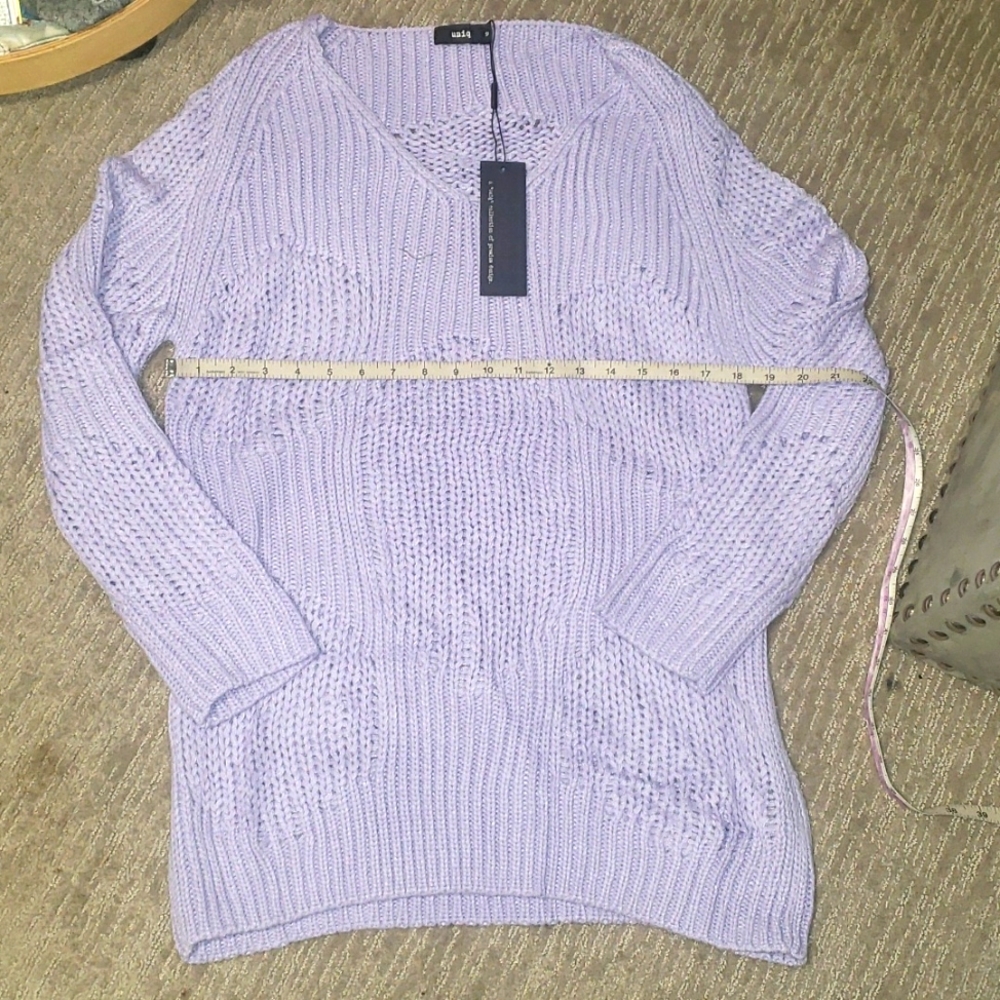 Uniq sweater p2p is 18 inches.